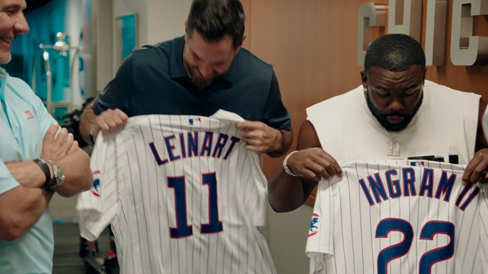 The Big Noon Kickoff crew sports Cubs jerseys after a trip to Wrigley Field