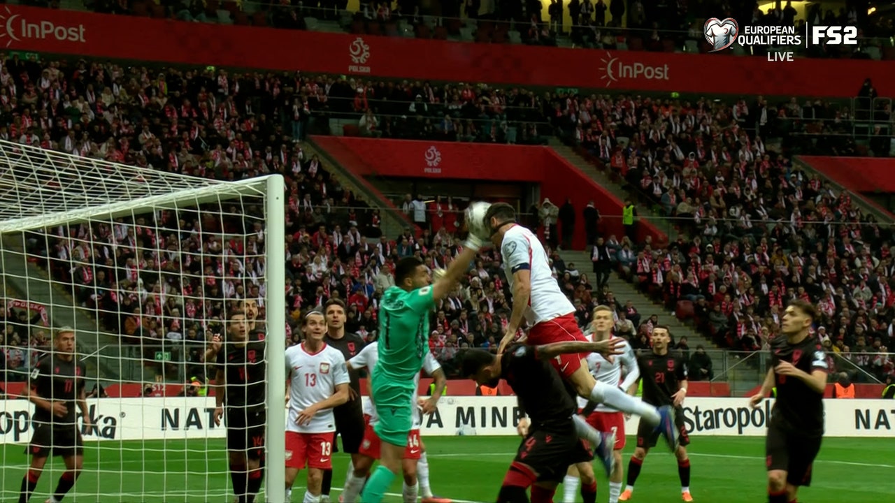 Poland's Robert Lewandowski converts header off corner kick for equalizer against Albania
