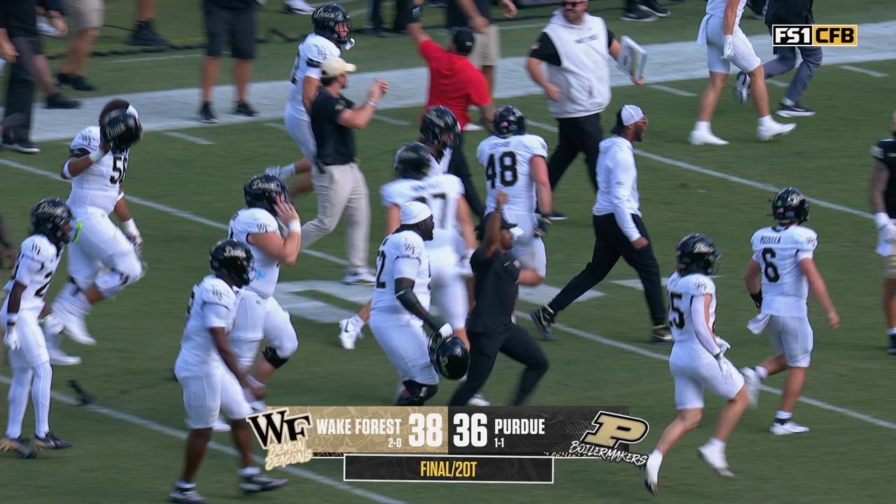 Wake Forrest's Gio Lopez scrambles for touchdown and two-point conversion to defeat Purdue in 2OT