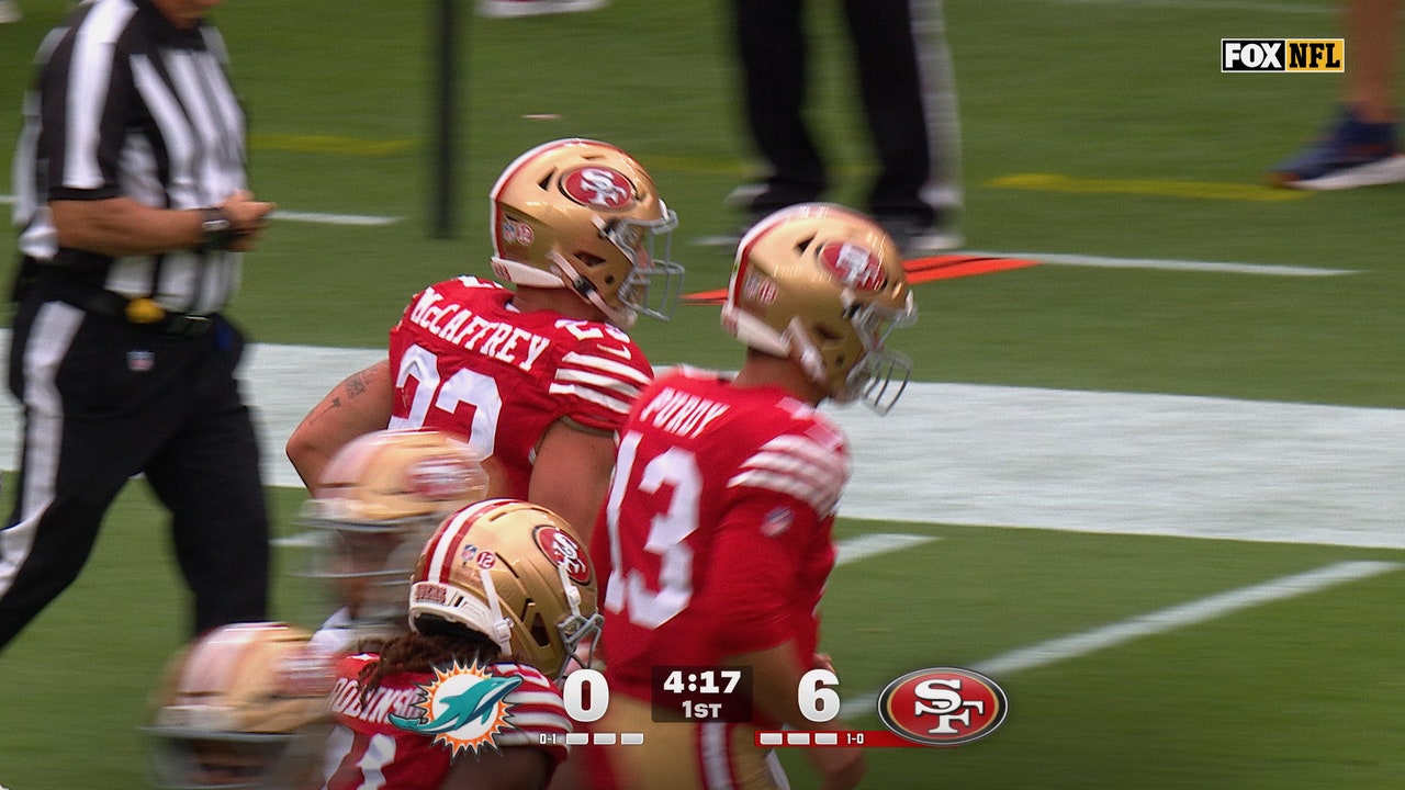 Christian McCaffrey rushes up the middle for 1-yard TD, giving 49ers lead over Dolphins