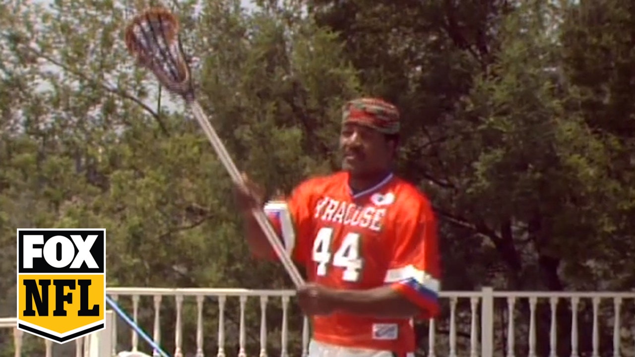 Rich Russo plays lacrosse with Jim Brown