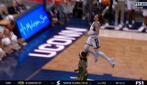 Solomon Ball intercepts pass and throws down a TOMAHAWK slam to extend UConn's lead over Le Moyne