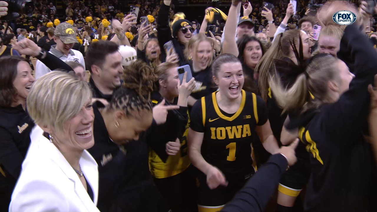 Iowa fans storm Carver-Hawkeye Arena after upsetting JuJu Watkins, No. 4 USC Trojans on Caitlin Clark's jersey retirement day 