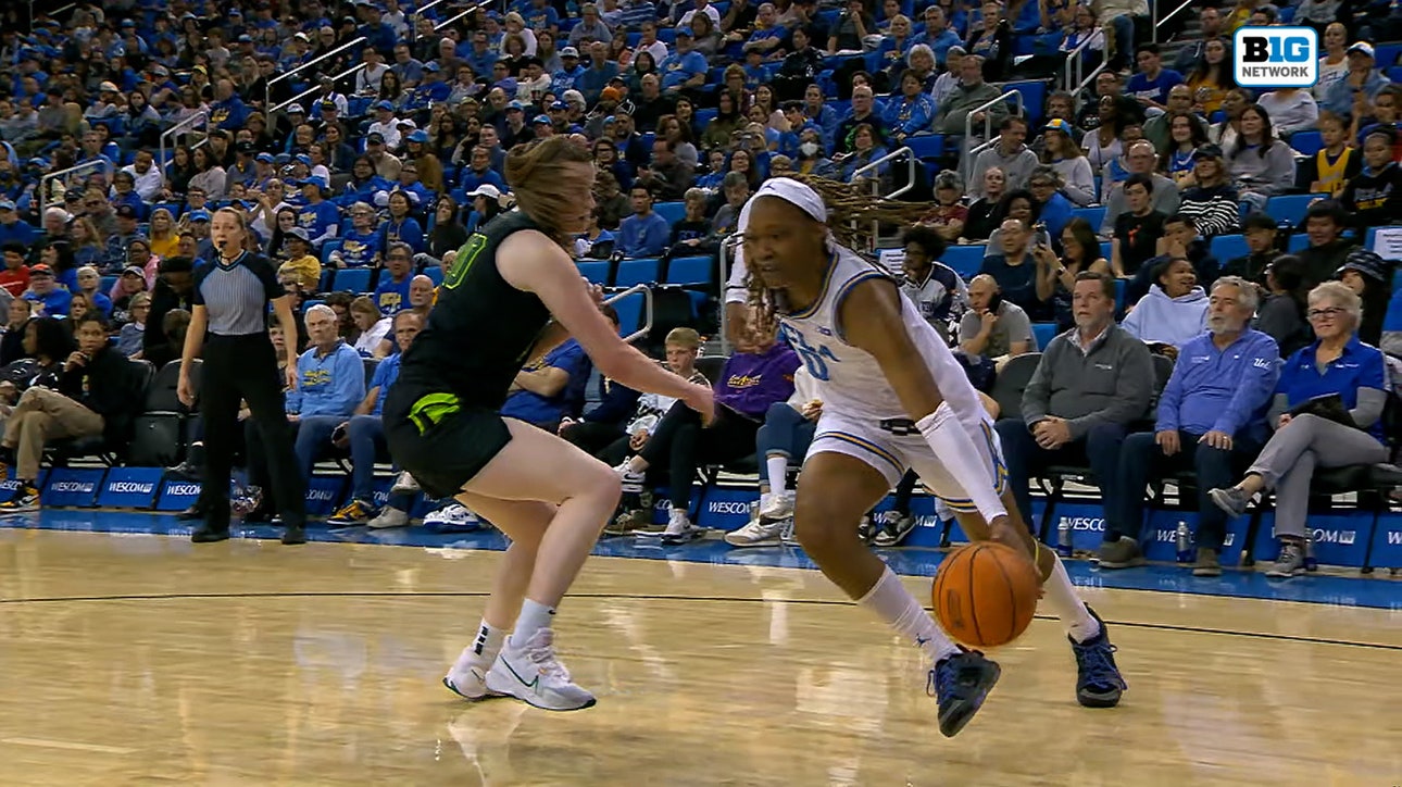 UCLA's  Janiah Barker aggressively drives to rim and finishes tough and-1 layup vs. Michigan State