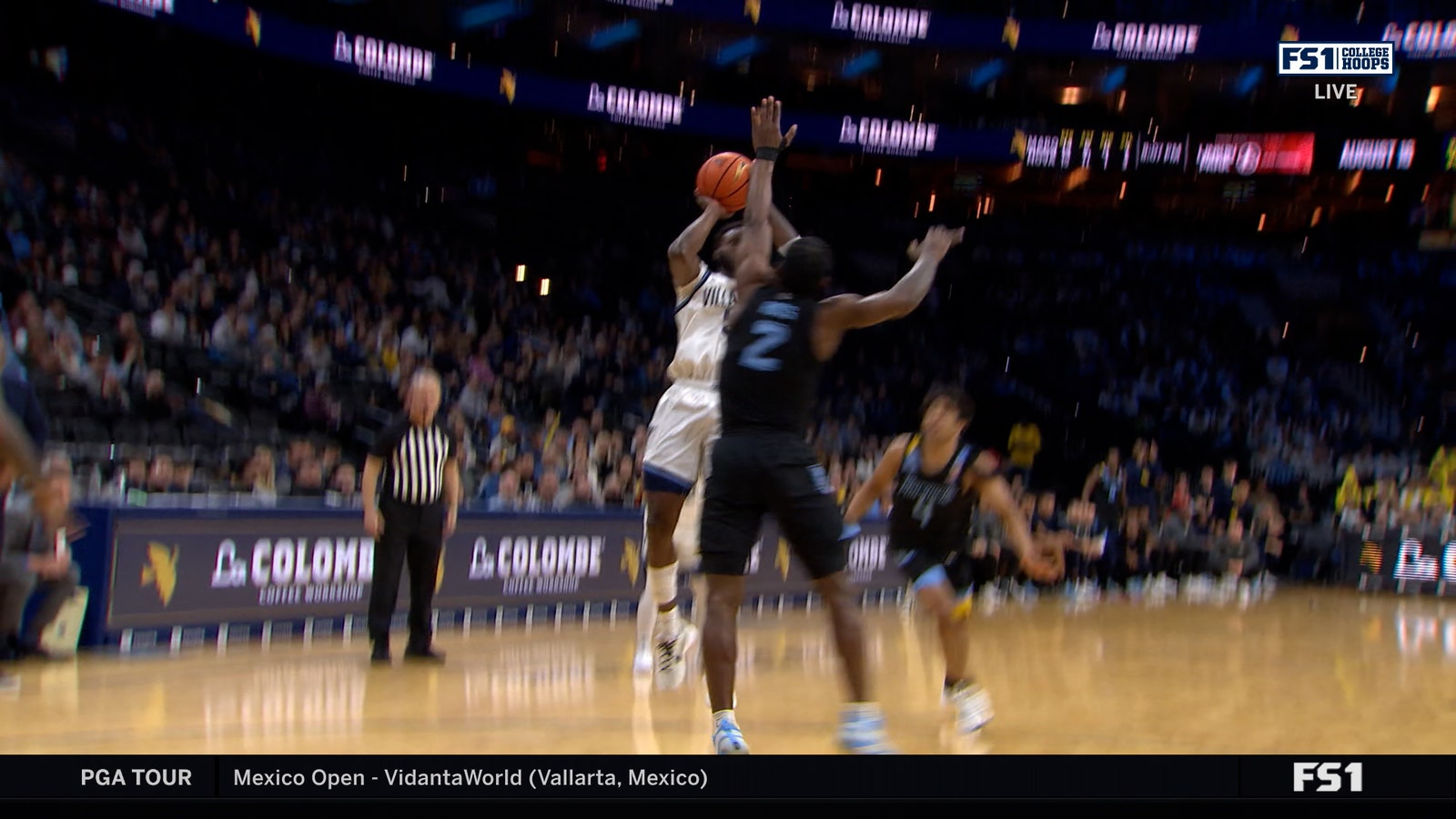 Wooga Poplar dari Villanova membuat jumper pull-up untuk memperpanjang keunggulan melawan Marquette