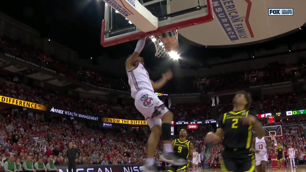 John Tonje gets the steal and finishes the tomahawk slam, extending Wisconsin's lead vs. Oregon