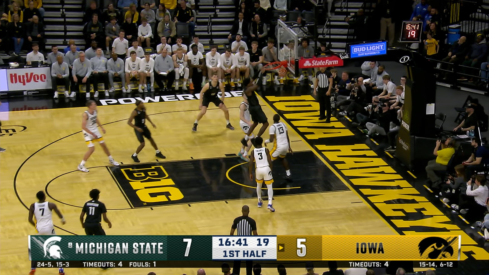 Coen Carr throws down a dunk, extending Michigan State's lead over Iowa