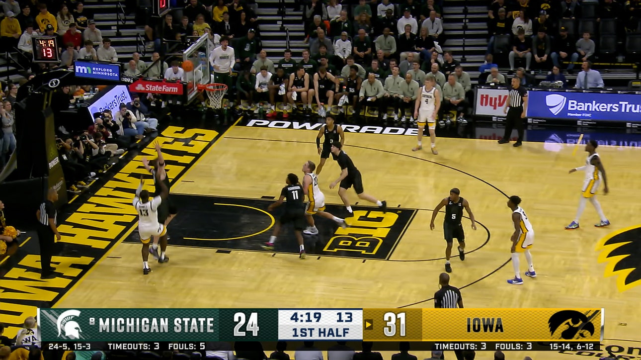 Iowa's Ladji Dembele hits a fadeaway jump shot against Michigan State 
