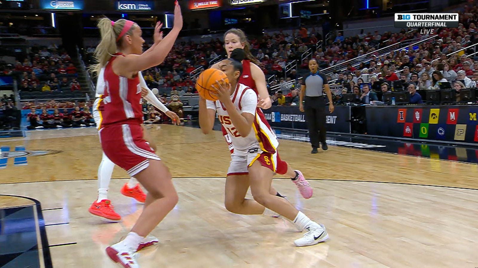 JuJu Watkins splits through Indiana defenders and finishes to give USC lead