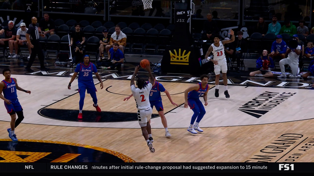 Jizzle James connects with Dillon Mitchell on fastbreak sequence for an impressive jam vs. DePaul