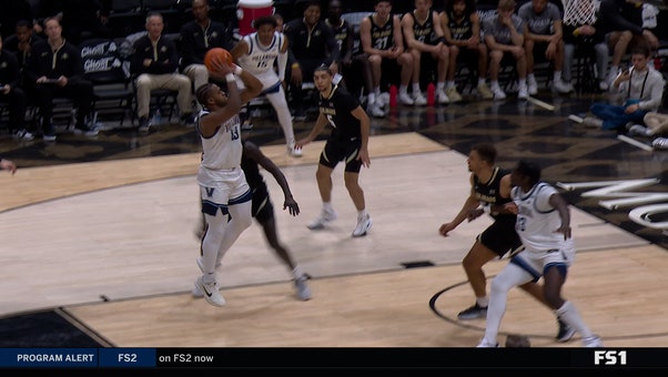 Eric Dixon drains a midrange jumper to pass Kerry Kittles as Villanova's all-time leading scorer