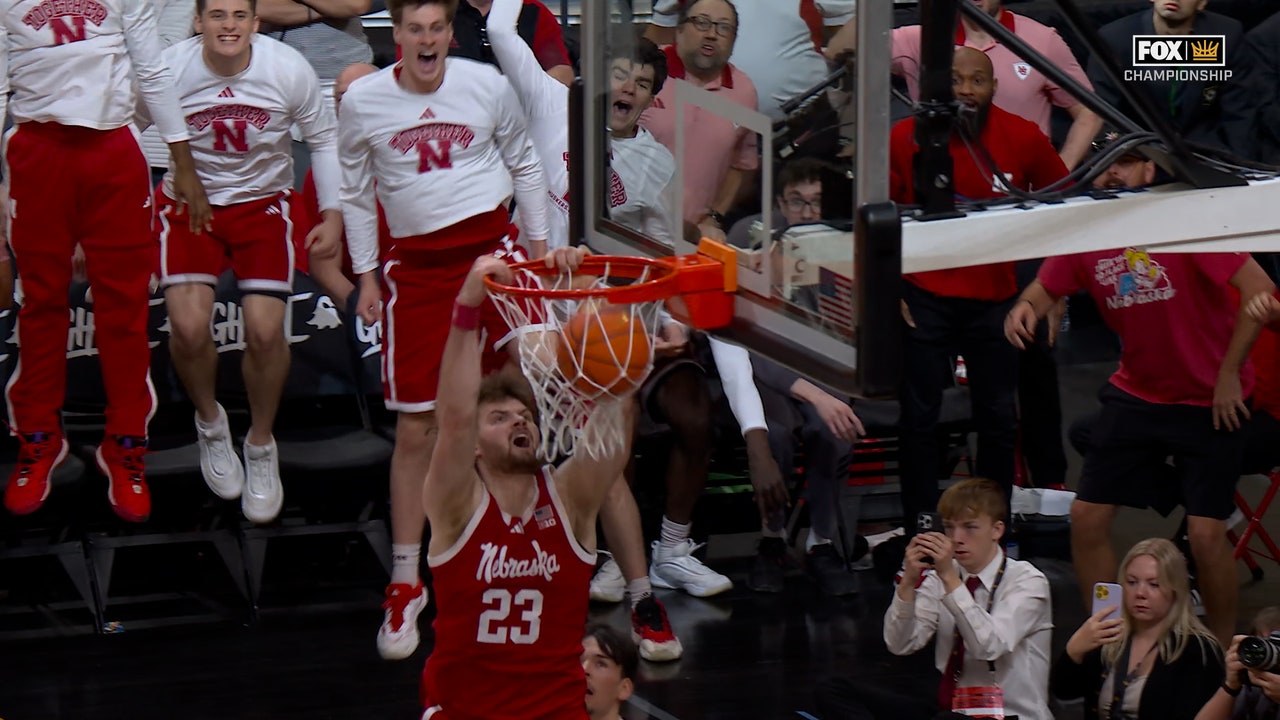 Andrew Morgan throws down a vicious dunk, extending Nebraska's lead over UCF