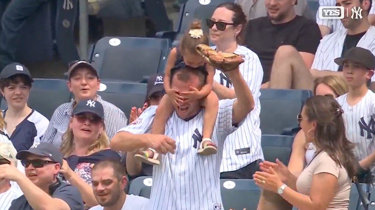 Yankees' fan makes an impressive catch on a foul ball with daughter blocking sight