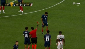 Dominican Republic's Edgar Pujol is sent off after receiving red card vs. Suriname