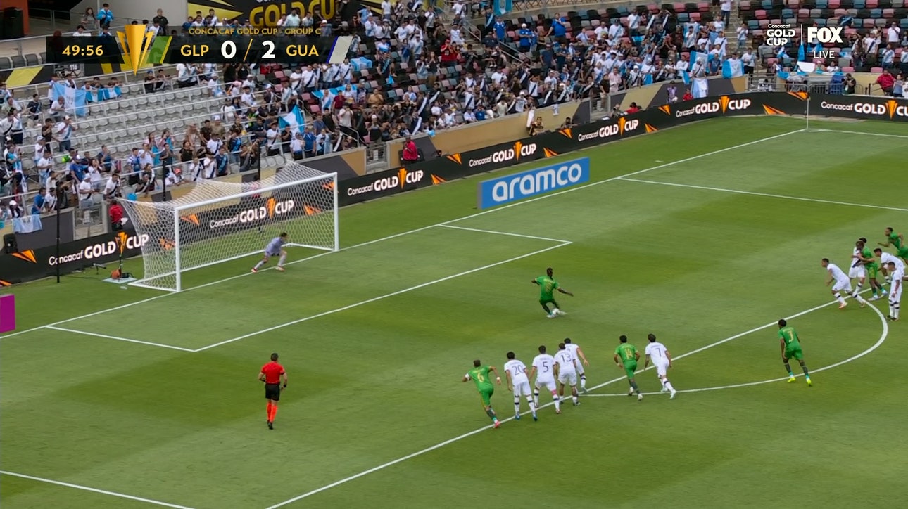 Guadeloupe's Ange-Freddy Plumain converts a penalty, trimming Guatemala's lead