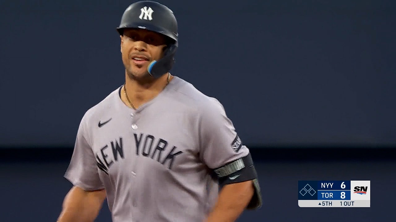 Giancarlo Stanton crushes a three-run home run, trimming Yankees deficit vs. Blue Jays