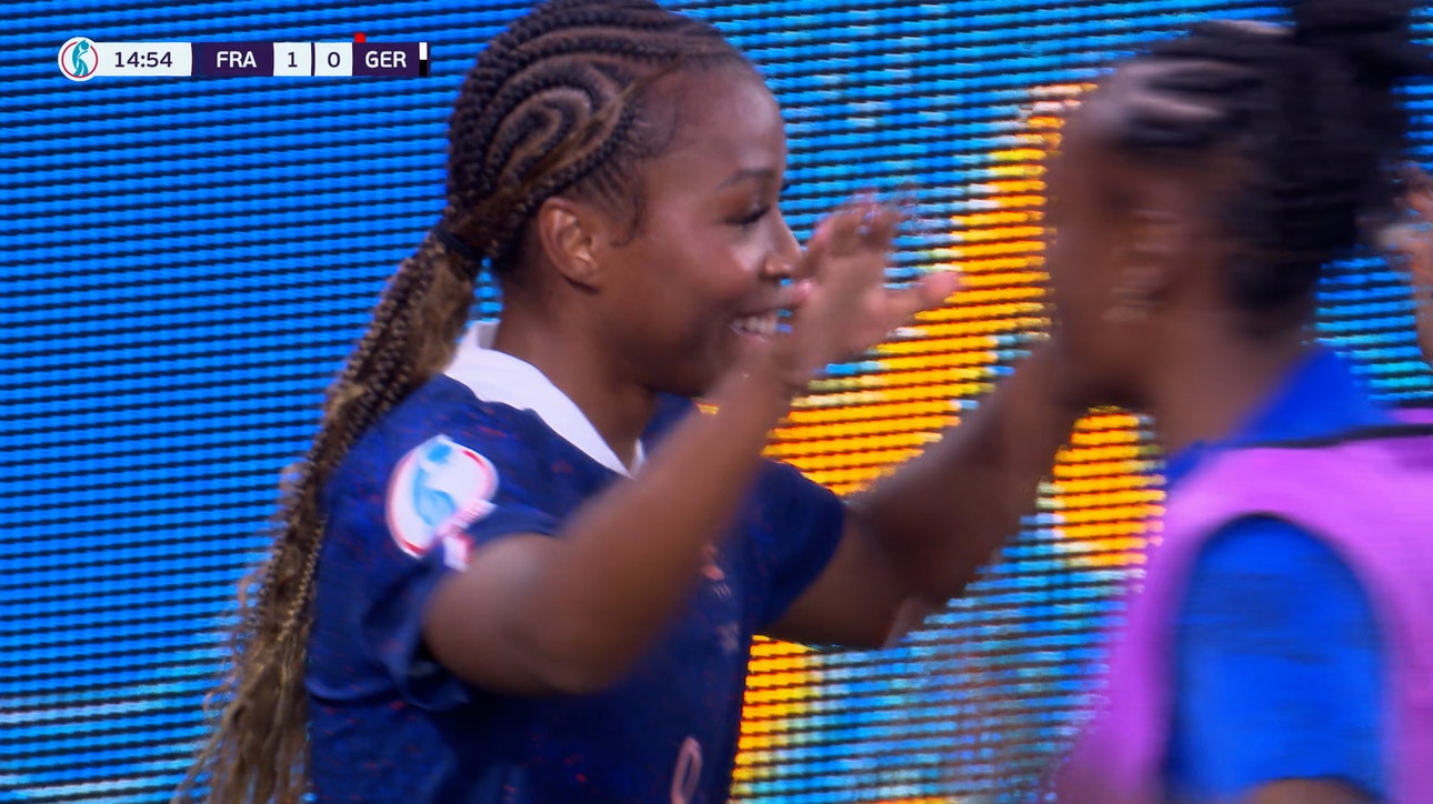 France's Grace Geyoro converts from the spot after an unusual red card
