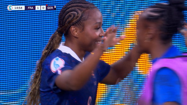 France's Grace Geyoro converts from the spot after an unusual red card