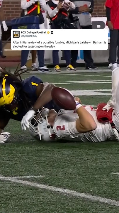 Michigan's Jaishawn Barham gets called for targeting against New Mexico
