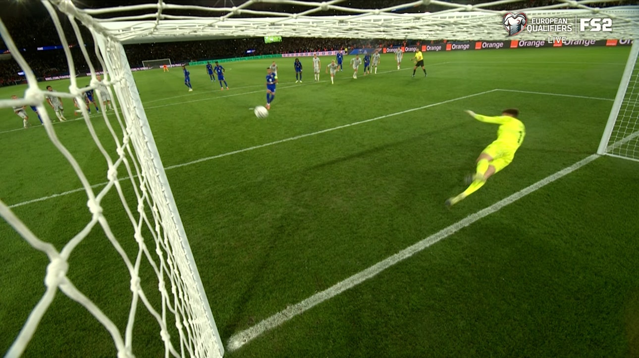 France's Kylian Mbappe finishes the PK to equalize 1-1 against Iceland