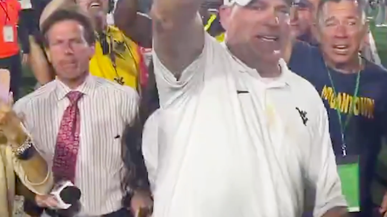 West Virginia head coach Rich Rodriguez was HYPED after OT win against Pitt!