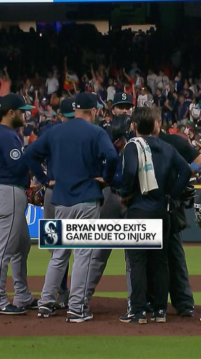 Bryan Woo exited the game after apparent injury