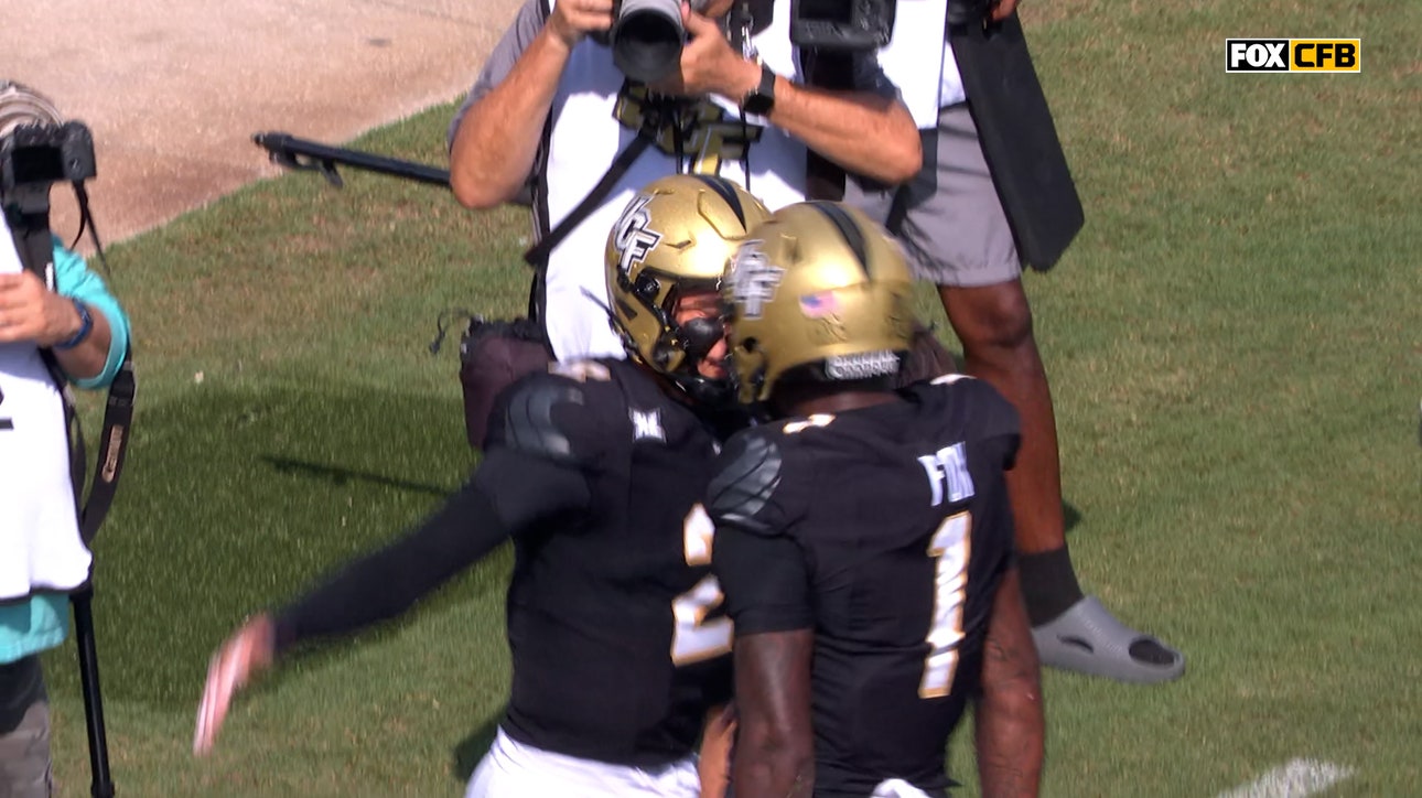 QB Tayven Jackson rushes into the end zone for a TD, giving UCF lead over North Carolina