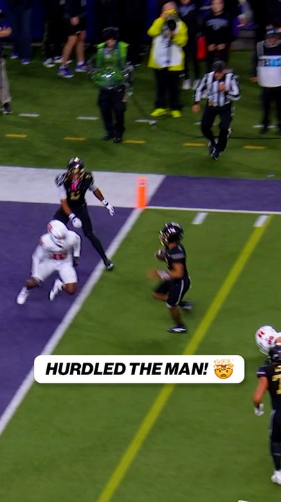 DEMOND WILLIAMS HURDLES A MAN FOR THE TOUCHDOWN