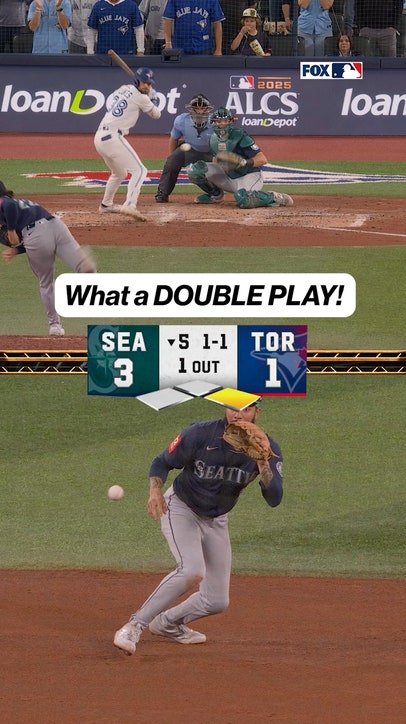 J.P. Crawford JUMPS over runner turning two 🤯