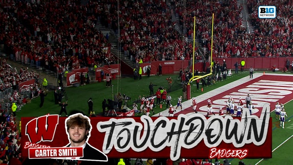 Wisconsin defense forces a fumble, leading to Carter Smith’s rushing touchdown to tie game against Washington