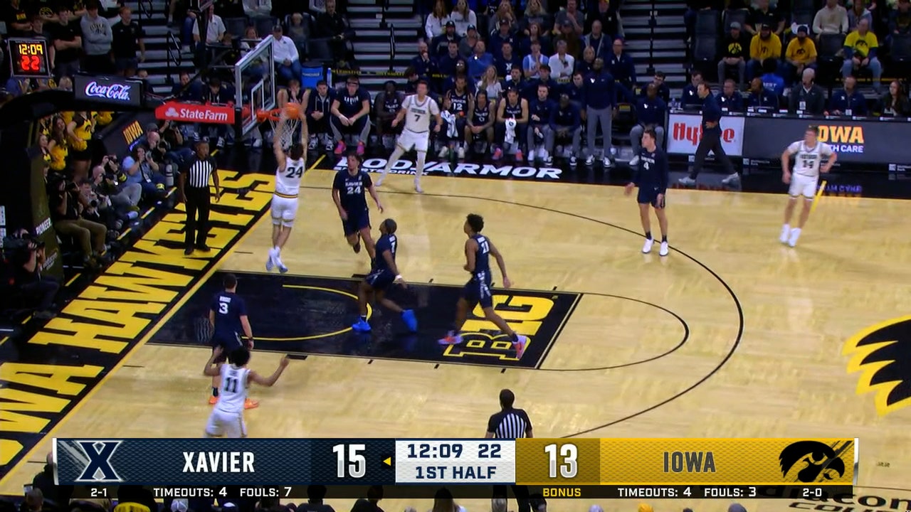 Iowa's Tate Sage cuts up the middle for a two-handed slam vs. Xavier