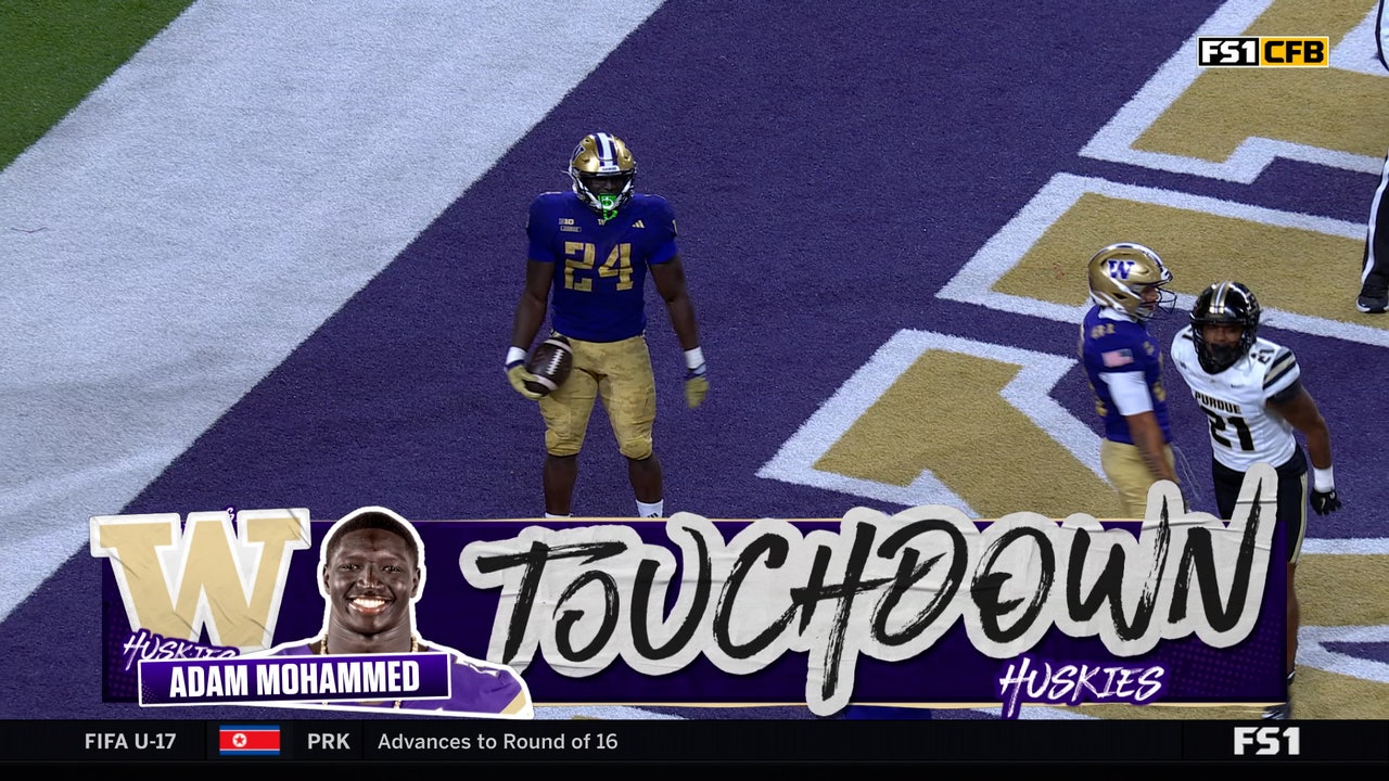 Adam Mohammed punches it into end zone, extending Washington’s lead over Purdue
