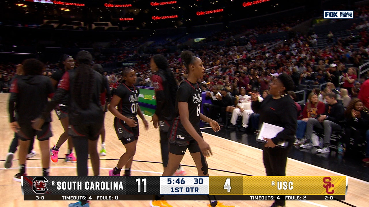 South Carolina's Joyce Edwards spins around USC defender to finish the layup