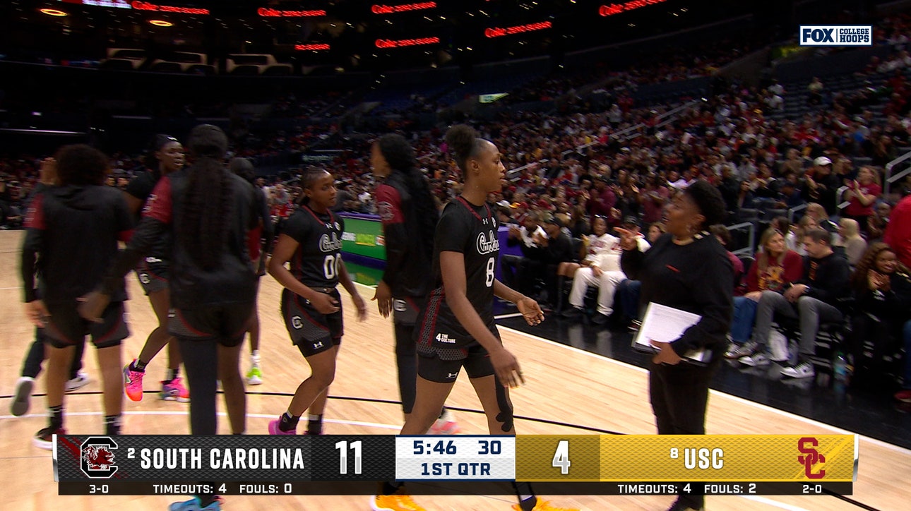 South Carolina's Joyce Edwards spins around USC defender to finish the layup