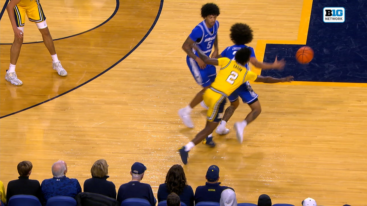 L.J. Cason gets steal and throws down two-handed SLAM dunk to extend Michigan’s lead over Middle Tennessee