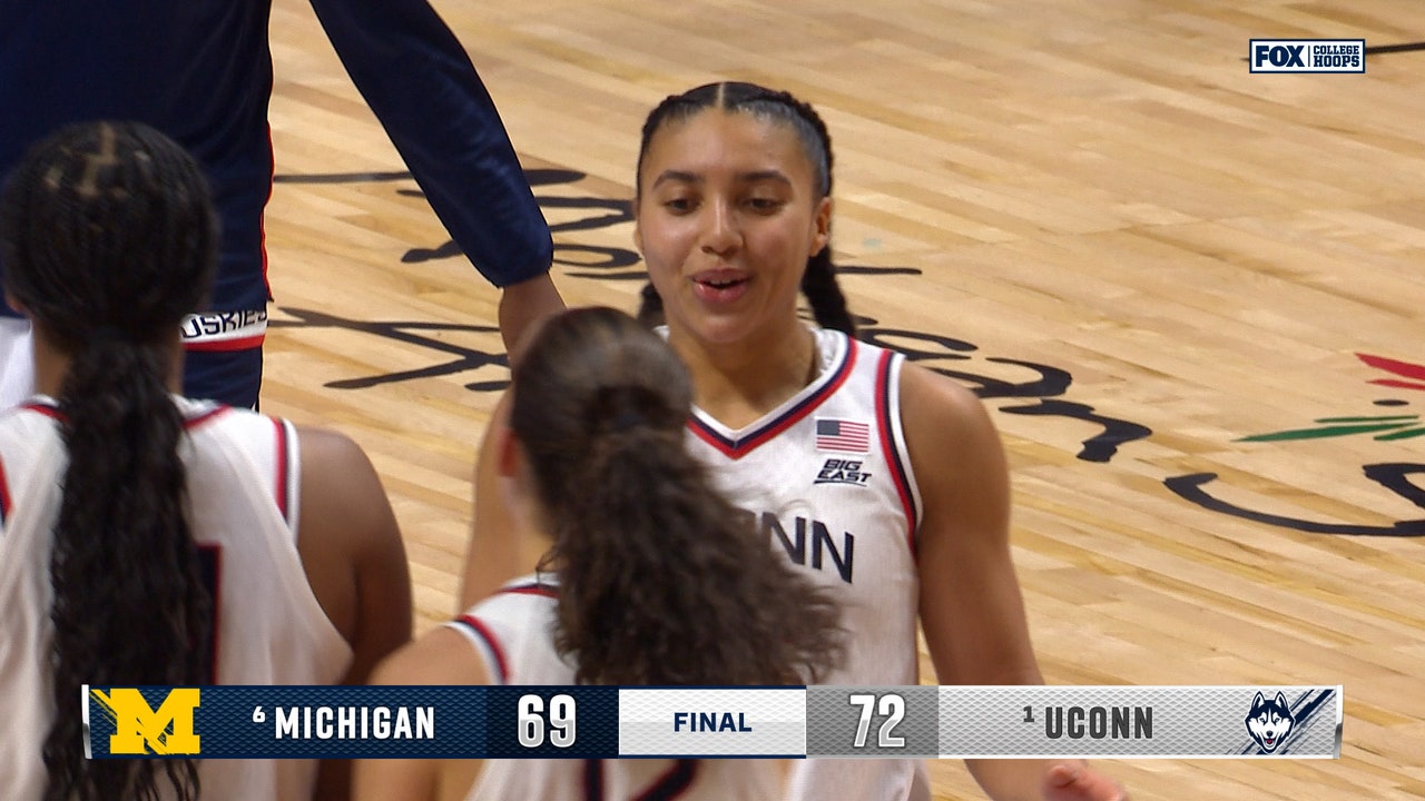 UConn forces clutch stop to hold off No. 6 Michigan, winning 72-69