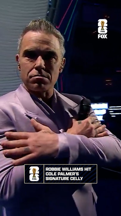 Robbie Williams hit a little 'Cold Palmer' celly during his performance at the 2026 FIFA World Cup Draw 🥶😅