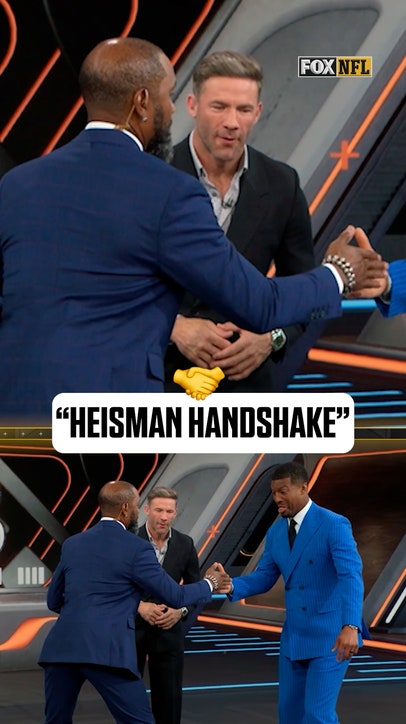 Charles Woodson & Jameis Winston Heisman Handshake 🤝
