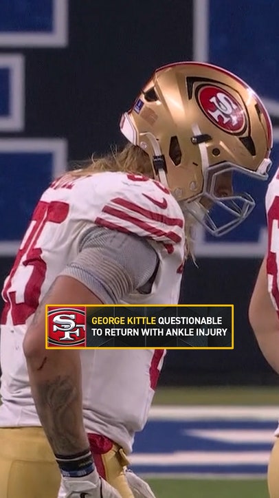 George Kittle struggles to walk on the sideline with an ankle injury 