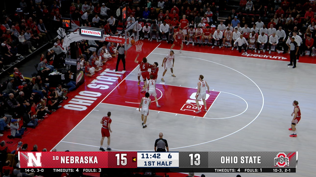 Braden Frager crosses up for a layup extending Nebraska's lead over Ohio State 