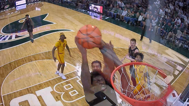 Michigan States' Coen Carr Posterizes Defender with Slam Dunk vs. USC