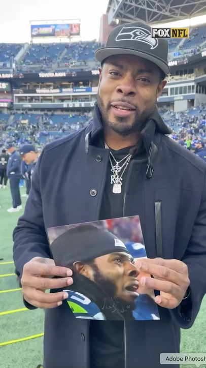 Richard Sherman couldn’t believe we asked him to sign this 😂😭