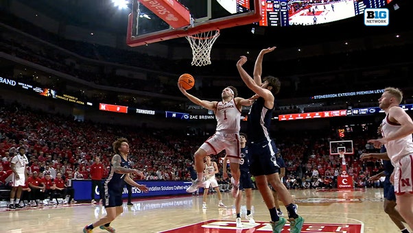 Nebraska's Sam Hoiberg attacks the rim and finishes for an and-one vs. Penn State