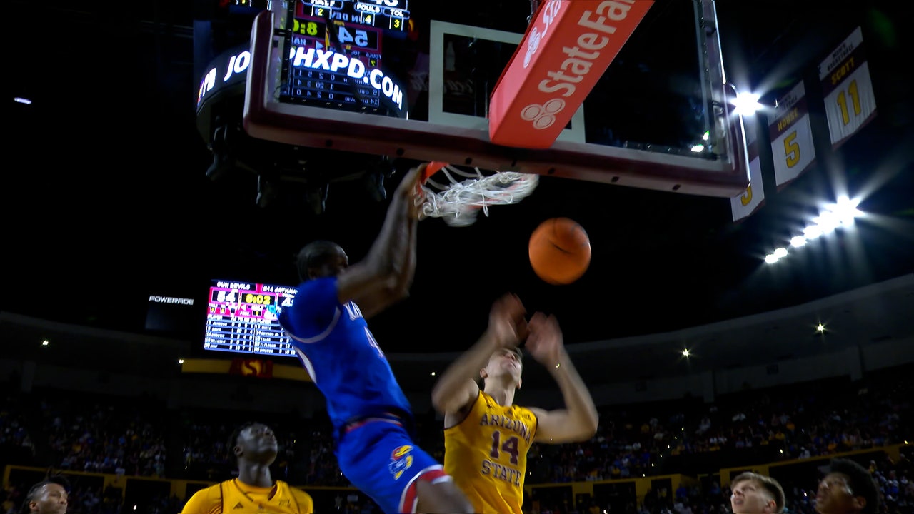 Kansas' Darryn Peterson drives and dishes to Flory Bidunga for slam vs. Arizona State