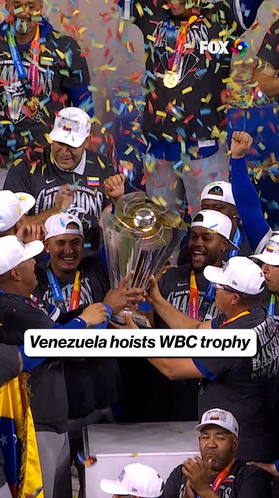 Venezuela raises the trophy after winning WBC!