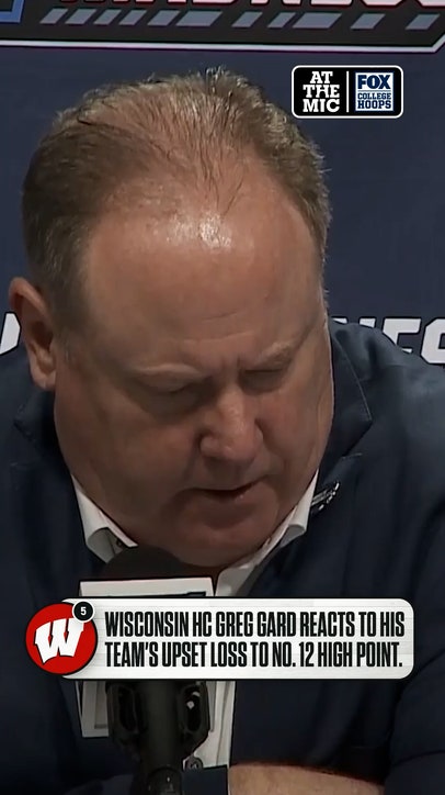Greg Gard reacts to his team’s upset loss in the NCAA Tournament