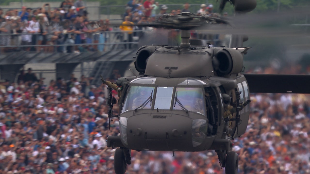 Military Helicopters lead the Pace Lap for America at the Indy 500