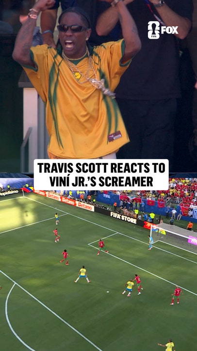 Travis Scott was loving that goal from Vini Jr.