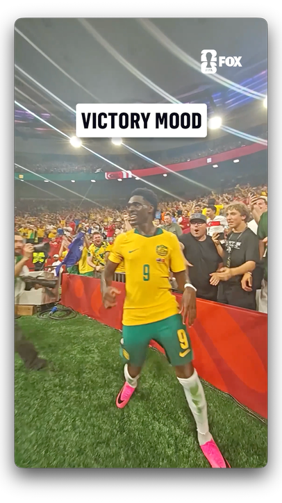 Mohamed Touré celebrating with the Australians in Canada