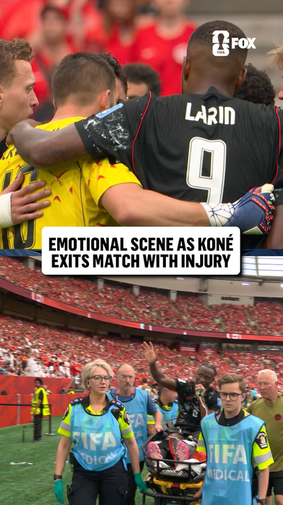 Ismaël Koné waves to the crowd in Vancouver after being carted off with an apparent leg injury